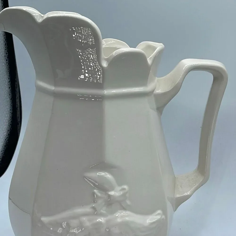 Vintage embossed ceramic country goose pitcher .